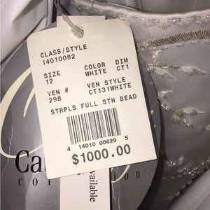 Beautiful box pleat ball gown wedding dress. New with tags.